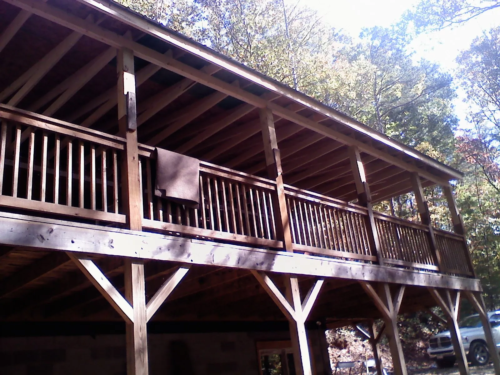 Timber framing under a new elevated porch and deck — Roof Leak Repair in Willow Creek by Roofing Brothers